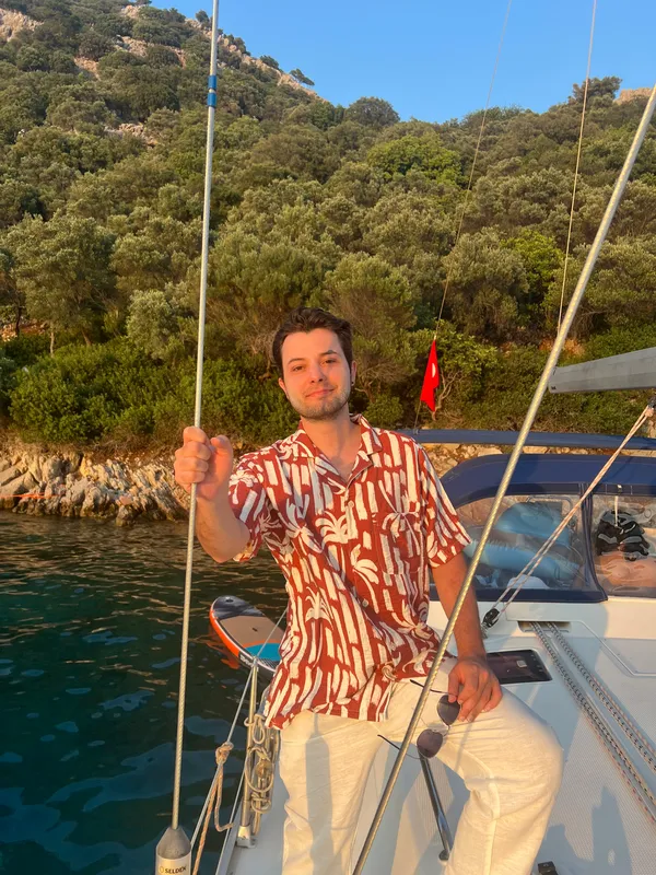 Burak sailing on a sunny day
